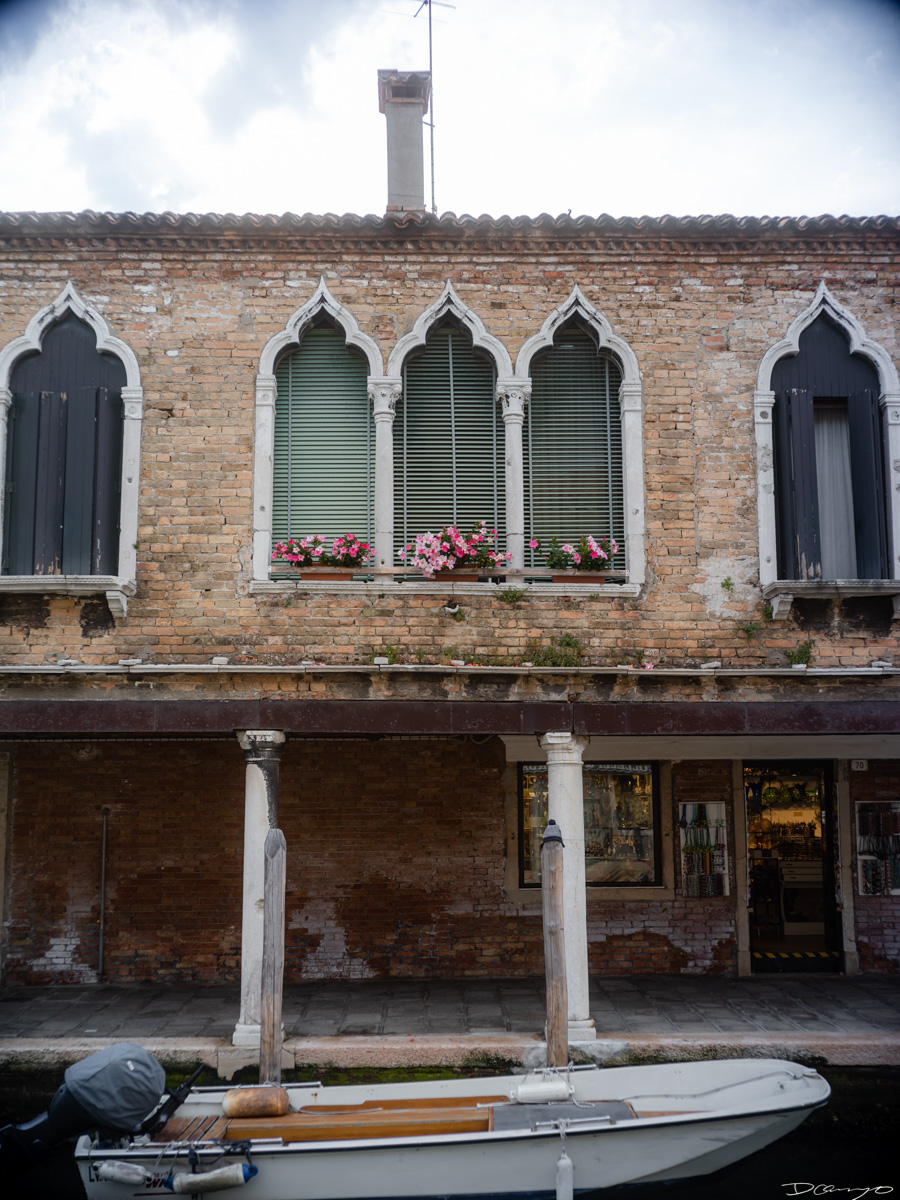 Photos from a trip through Italy in Summer of 2023. Locations include Rome, Florence, Tuscany, Castello di Bossi in Chianti, Siena, San Gimignano, Sirmione on Lake Garda, Bologna, Gudon, Italian Dolomites, Seceda, Cadini di Misurina, and Venice.